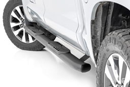 Oval Nerf Step Side Steps for Toyota Tundra (2007–2021) shown installed, Rough Country 21009