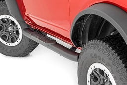 Oval Nerf Steps for 2021-2025 Ford Bronco 4WD (2-Door) shown installed, Rough Country 21012