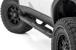 Oval Nerf Steps for Toyota Land Cruiser AWD (2024-2025) shown installed, Rough Country 21018