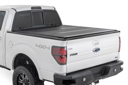 Hard Tri-Fold Tonneau Cover for F-150 5'7" Bed (2004–2014) shown installed, Rough Country 47214550B
