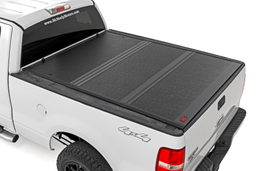 6'7" Bed Hard Tri-Fold Tonneau Cover for Ford F-150 (2004-2014) shown installed, Rough Country 47214650B