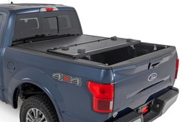 Hard Low-Profile Tri-Fold Cover for Ford F-150 5'7" Bed (2015-2020) shown installed, Rough Country 47220550B