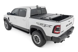 Hard Low Profile Tri-Fold Bed Cover for 2019–2025 Ram 1500, view 3, Rough Country 47320550B