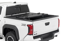 Low-Profile Tri-Fold Bed Cover for 2024 Toyota Tacoma (5' Bed), view 2, Rough Country 47415551B