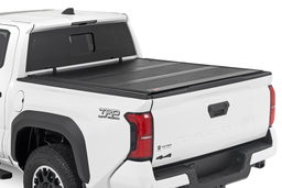Low-Profile Tri-Fold Bed Cover for 2024 Toyota Tacoma (5' Bed), Rough Country 47415551B