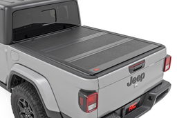 Hard Low Profile Tri-Fold Bed Cover for 2020-2025 Jeep Gladiator shown installed, Rough Country 47620500B