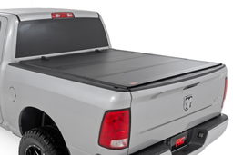 Hard Tri-Fold Flip Up Bed Cover (Rough Country 49318650) shown installed