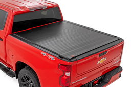 Hard Roll-Up Cover for 6'7" Bed GM 1500 (2019–2025) shown installed, Rough Country 50210650