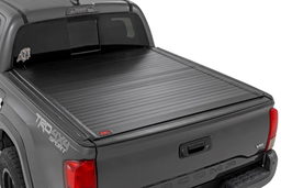 Hard Roll-Up Bed Cover for 2016–2023 Toyota Tacoma shown installed — Rough Country 50420500