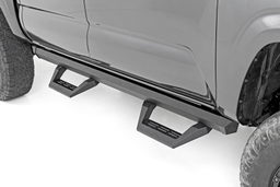 SRX2 Adjustable Aluminum Steps for Tacoma 4WD/RWD (2005–2023) shown installed, Rough Country 71000A