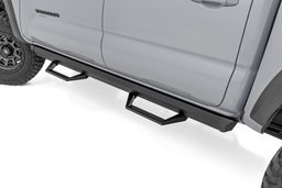 SRL2 Adjustable Aluminum Steps for Tacoma Double Cab (2005-2023) shown installed, Rough Country 71096