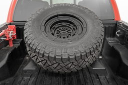 Bed-Mount Spare Tire Carrier for 2016-2023 Toyota Tacoma shown installed, Rough Country 73110