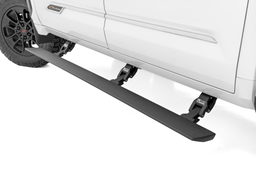 Power Running Boards for 2022–2025 Toyota Tundra Crew Cab shown installed, Rough Country PSR70911
