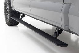 Power Running Boards for Ford F-150 Crew Cab (2015-2025) shown installed, Rough Country PSR71525