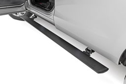 Power Running Boards for Ford Expedition 4WD/RWD (2018-2025) shown installed, Rough Country PSR91510